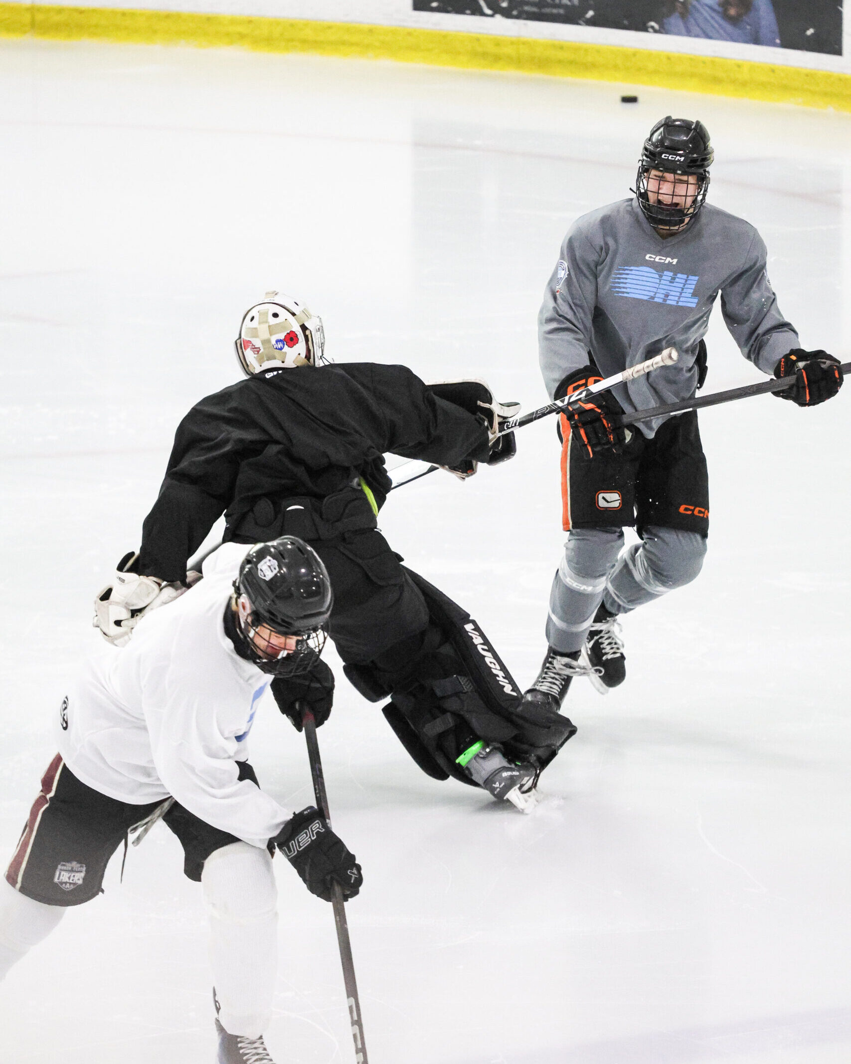 A group of A.S.A.D. London hockey players out on the ice.