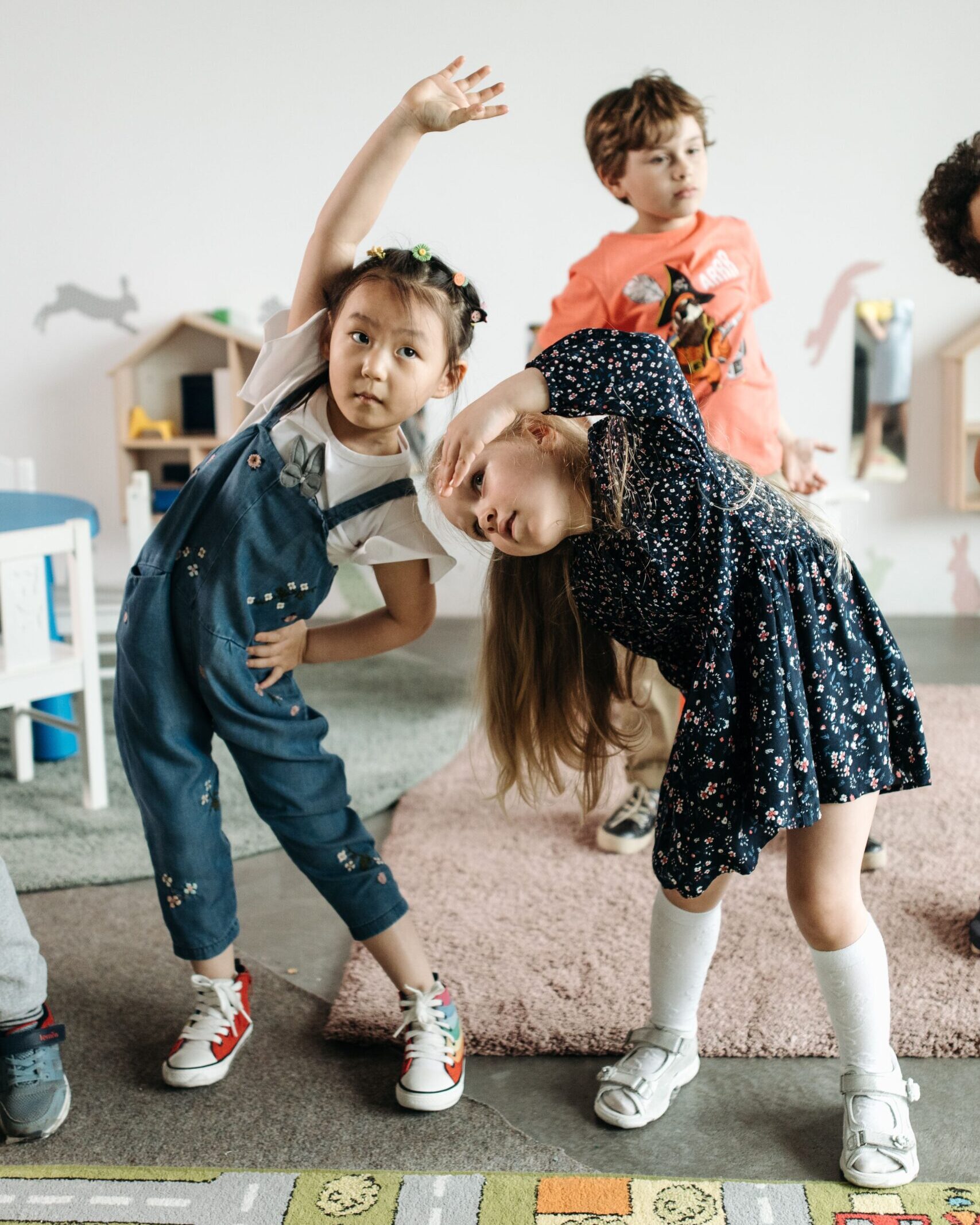 Little kids exercising.